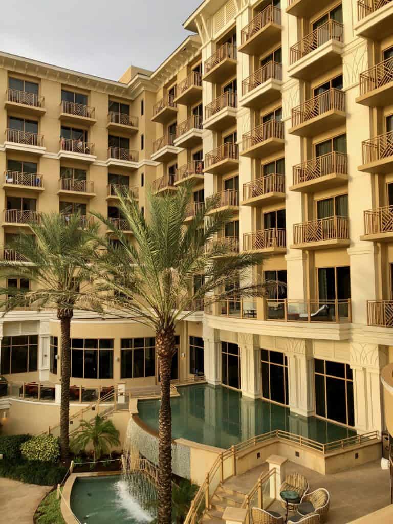 Spring Break St. Pete Hotel. Photo of The Sand Pearl Resort Hotel with it's multistory view of the water.  A beautiful luxury resort located on the sugar sand beach in Clearwater Beach. The rooms all have balcony views. 