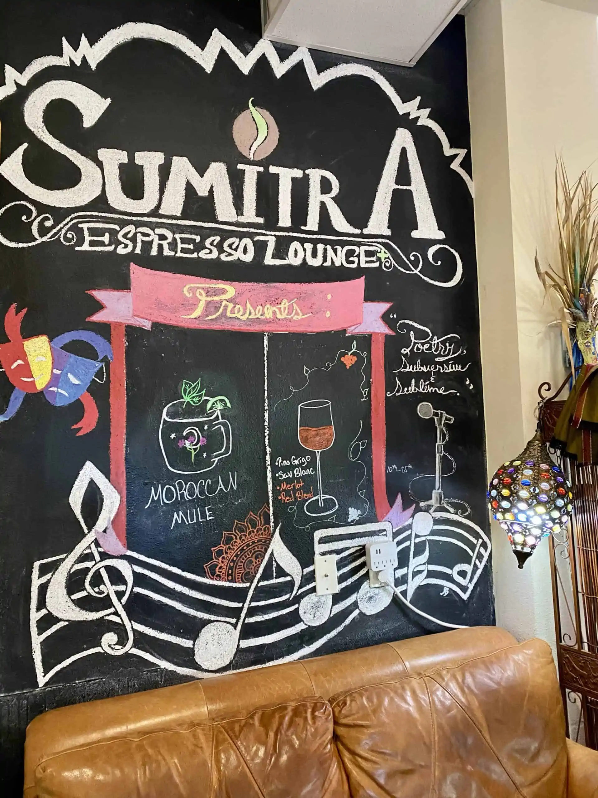 Sumitra Expresso Lounge, Restaurants in Gulfport Florida  showing the sign with Moroccan mule as a drink special