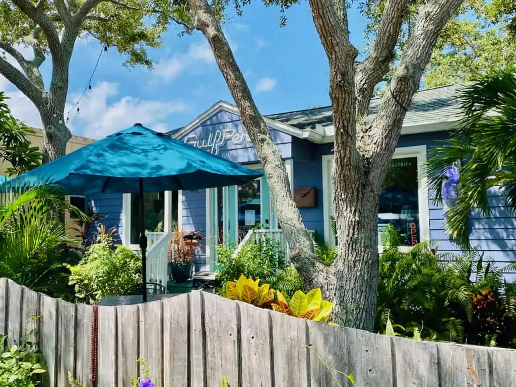Gulfperk Coffee in Gulfport FL has a delicious brunch in a lovely setting with a cute fence and near the gulfport casino. 