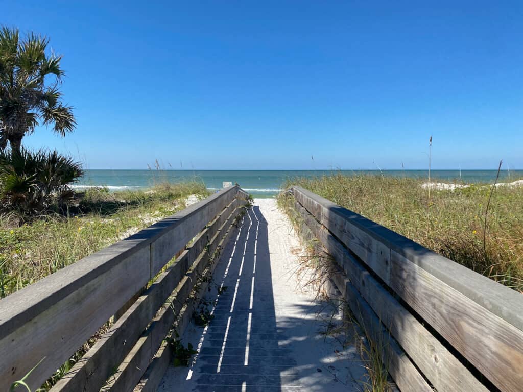 Walkway to the beach with white sandy beaches, things to do in Indian Rocks Beach.