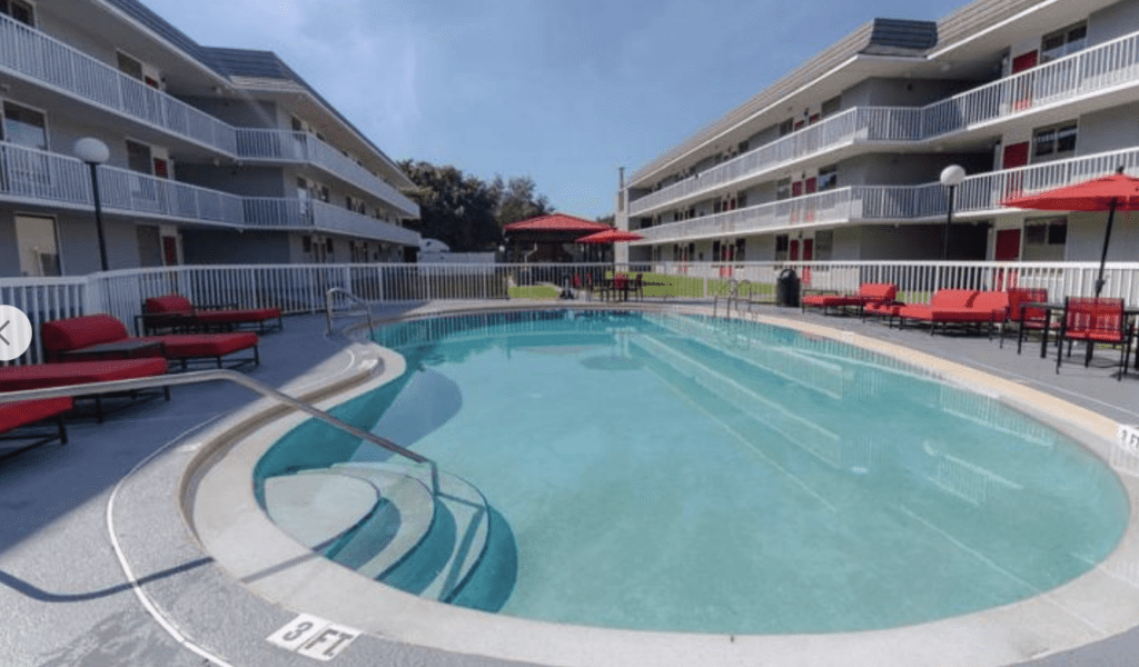 Equus Inn Pool View and outdoor grill area