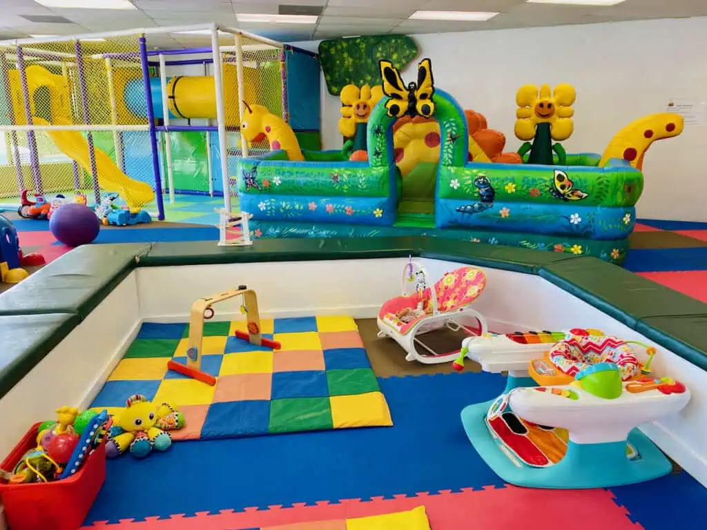 Toddler classes clearwater occur in this large room with lots of musical instruments and toys to engage with at munchkin town