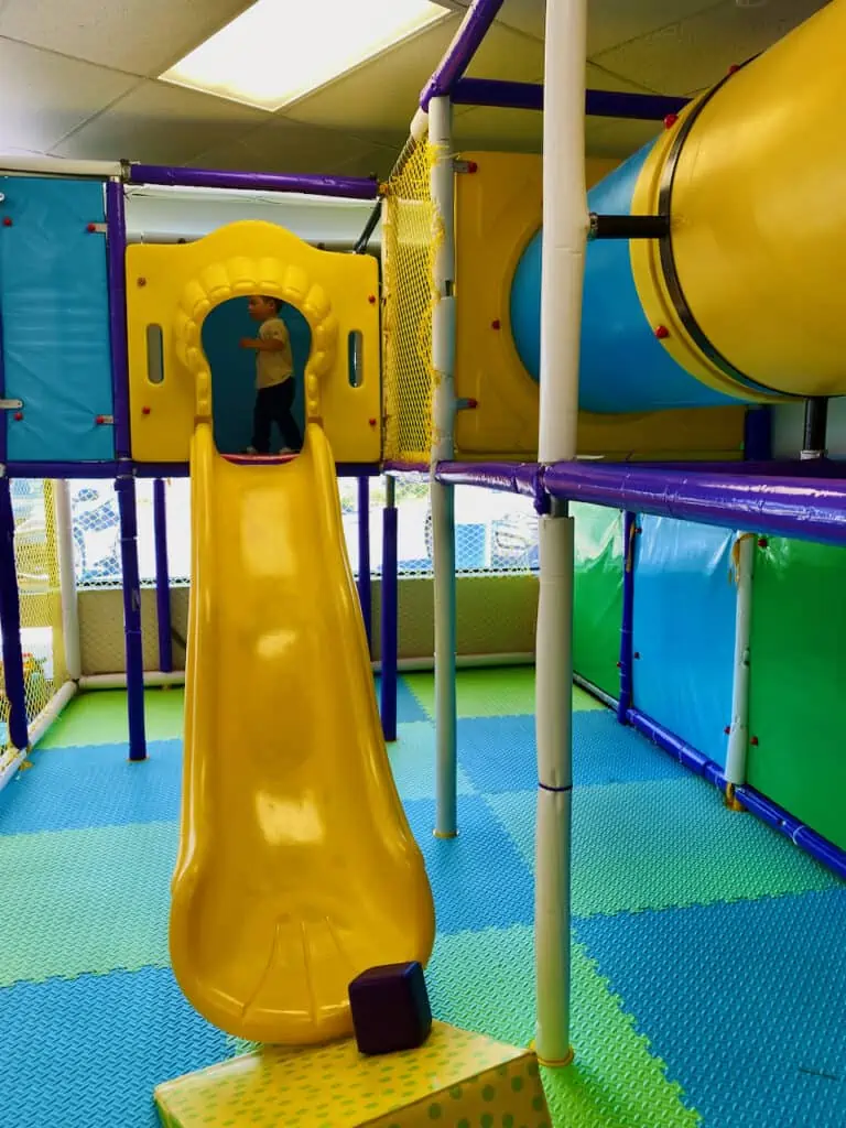 Munchkin Town play place area with slide and 2 level section