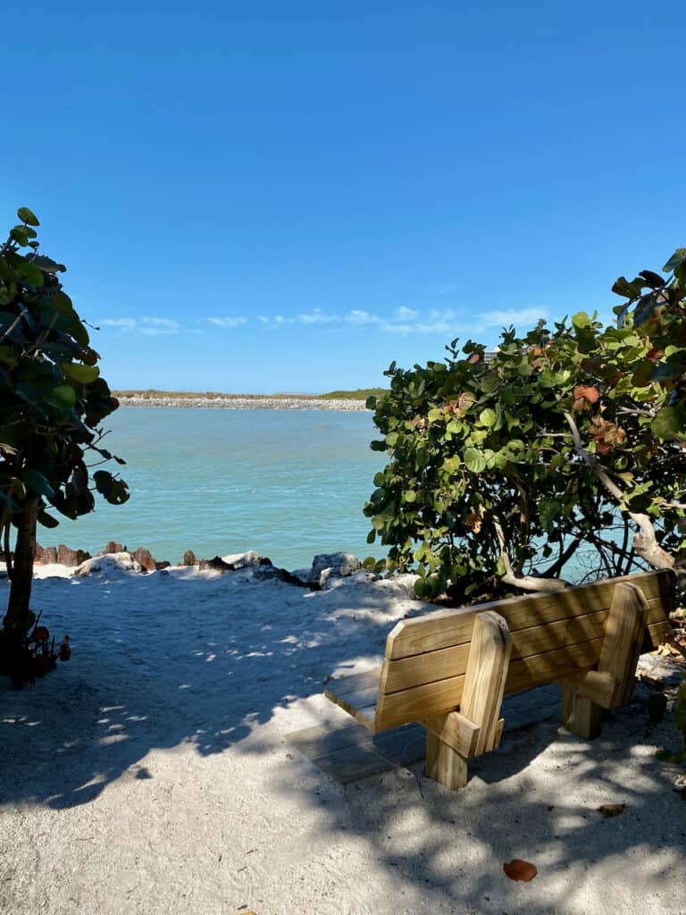 Secret Garden at Upham Beach in St Pete Beach with beautiful bench on the water 