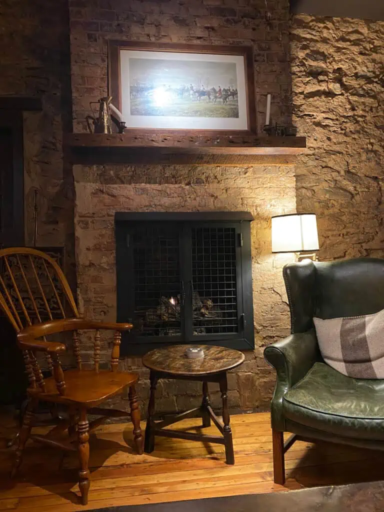 Heart & Crown Tavern - showing fire in the fireplace and comfortable seating like an old English pub.