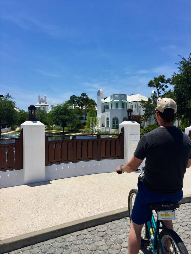 Biking photo in Alys Beach on a beautiful small bridge.