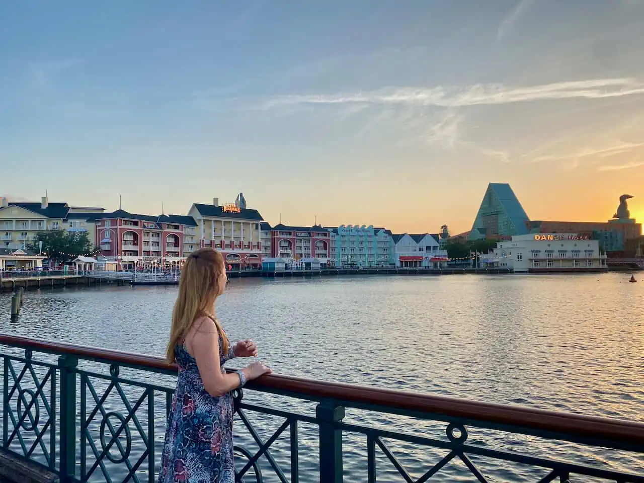 Erin at Disney Boardwalk with sunset int the distance