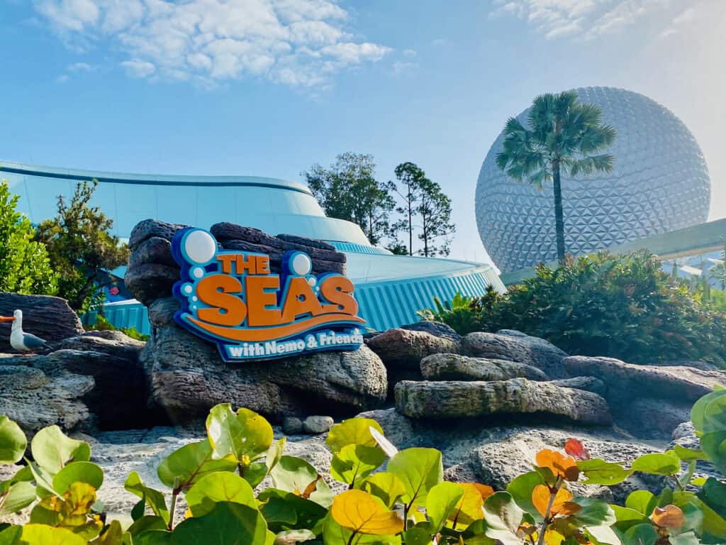 eat within an aquarium at EPCOT showing The Seas sign