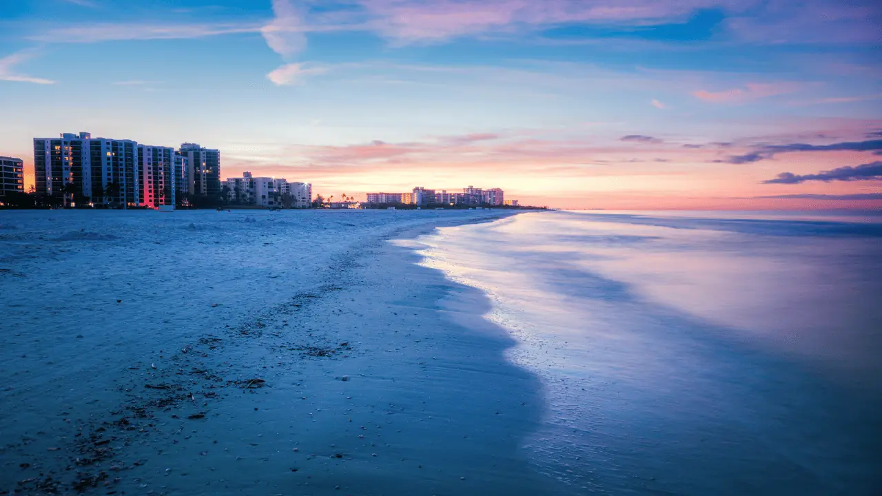 Fort Myers Beach at sunset by canva pro