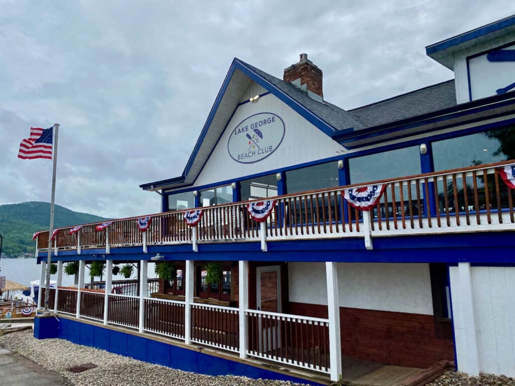 Lake George Beach Club has two wrap-around balconies with waterfront views of Lake George.