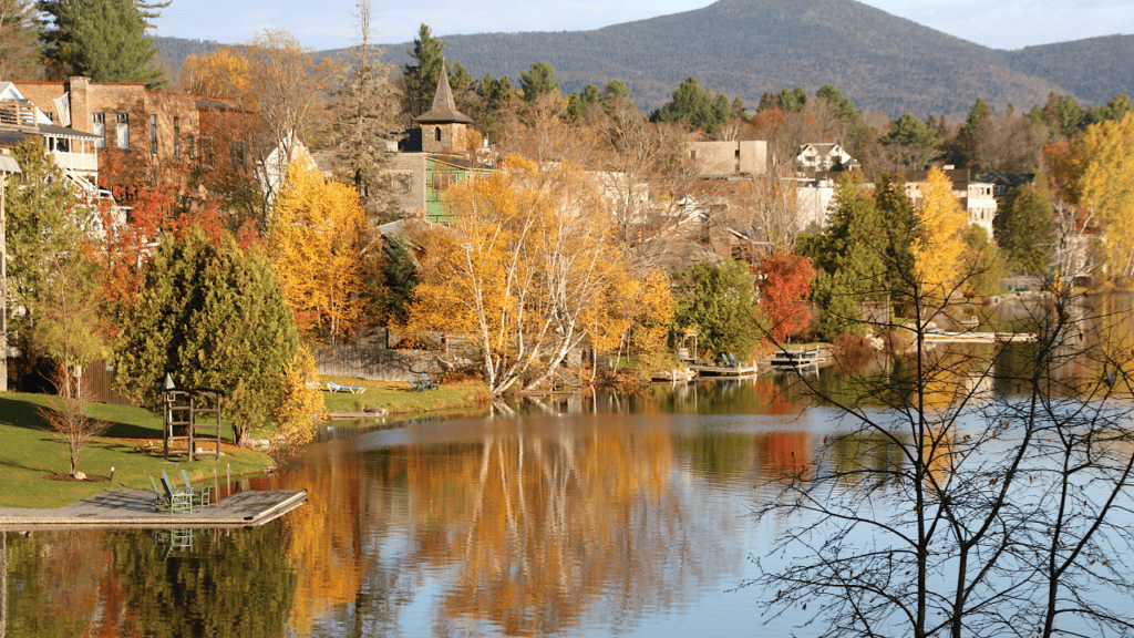 Lake George vs Lake Placid NY.  Lake Placid has a beautiful view of the fall foliage overlooking the lake.