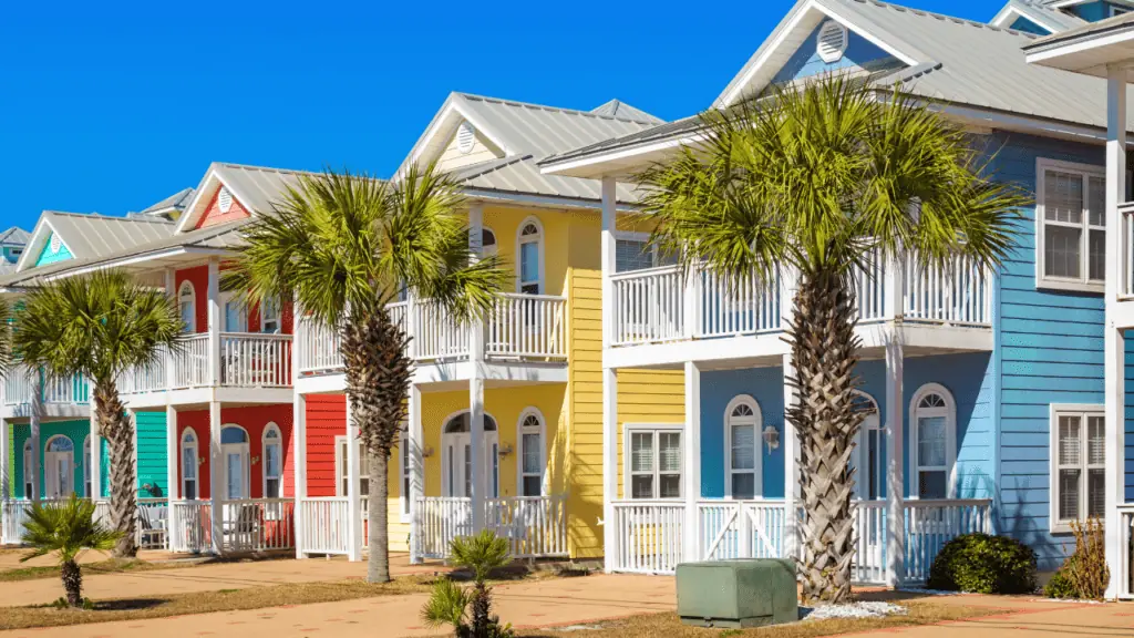 Panama City Beach houses  in colorful beach colors with bright yellow, blue, coral, and teal.
