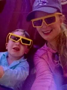 Erin and son wearing 3d glasses at Toy Story Mania.