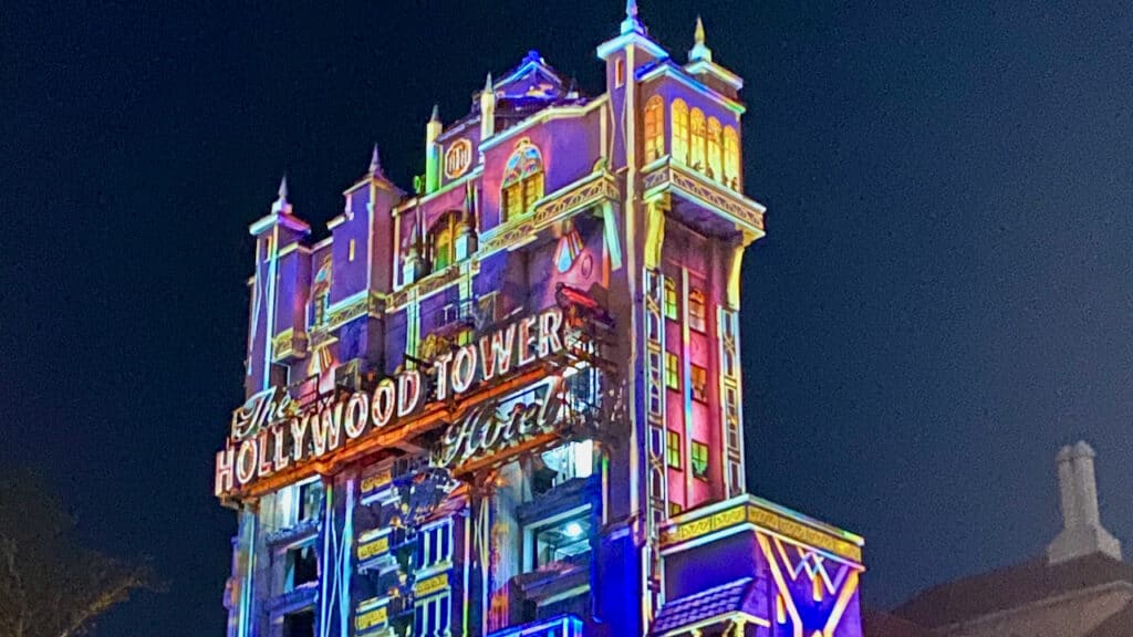 Twilight Zone Tower of Terror shown at night. Rides at Hollywood Studios vs Universal Studios