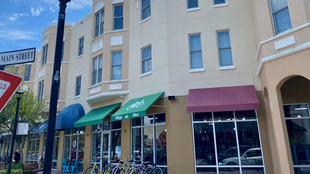 Lakewood Ranch Main Street Restaurants showing Main Street and restaurants and bike shop in the distance.