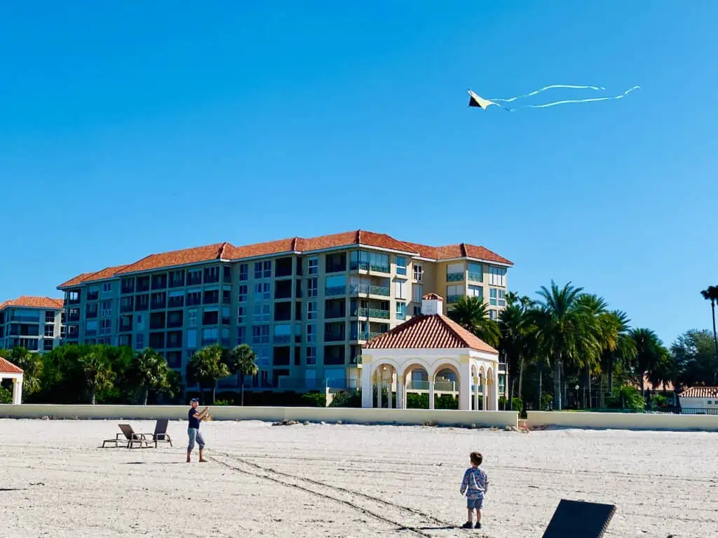 My family flying a kite on a Florida beach