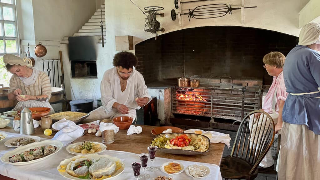 Colonial Williamsburg kitchen restauran with staff making food 