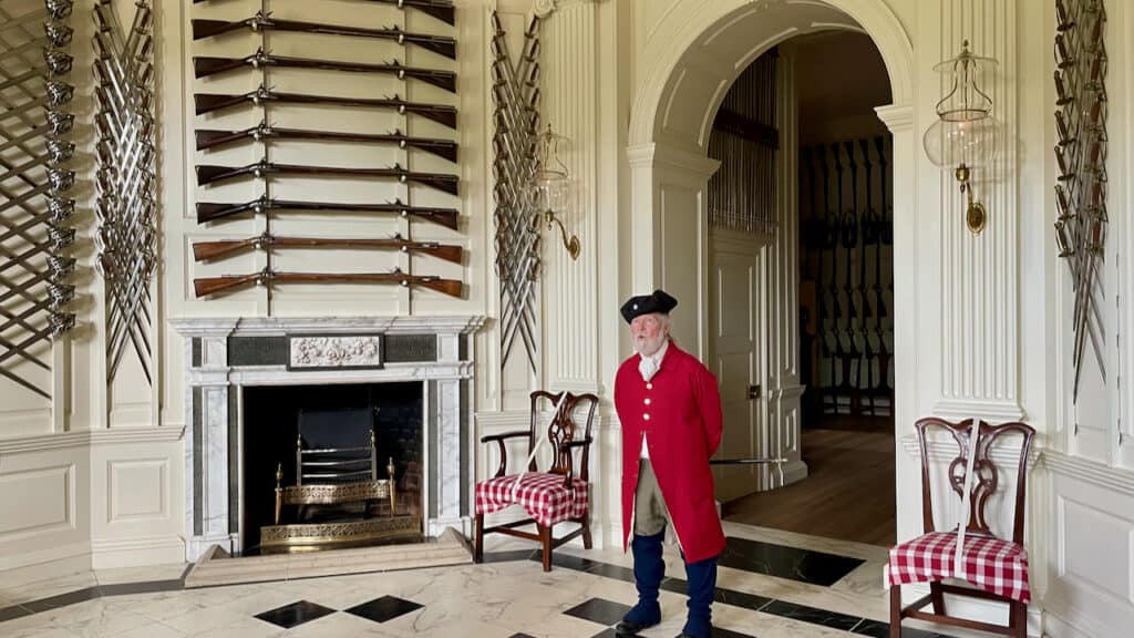 showing guard at the Colonial Williamsburg tour inside the hosue